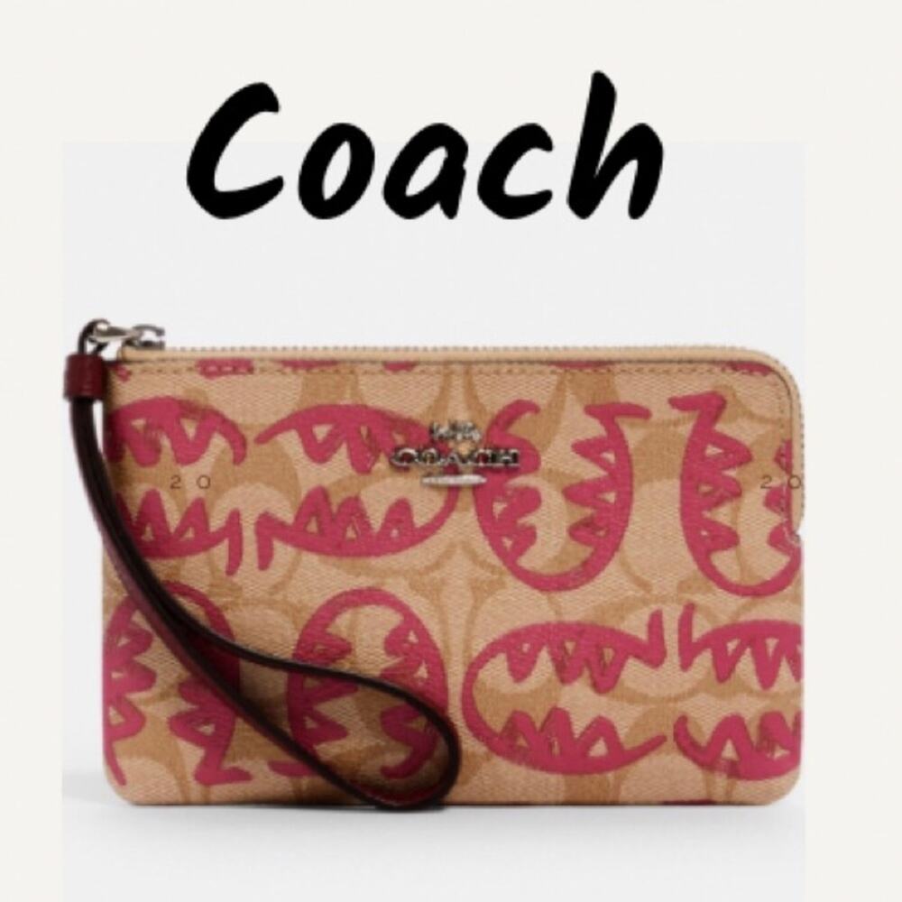 Limited Design Coach Corner Zip Signature Wristlet. Fits iPhone or Android.
